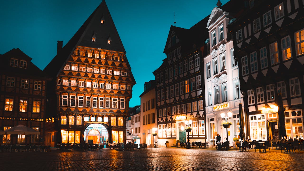 Beautifully illuminated evening scene in Hildesheim, Germany showcasing historical architecture.